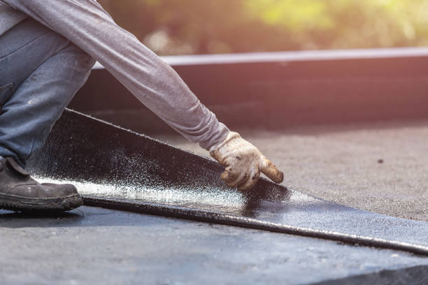 Professional Exterior Waterproofing technician working in Bloomington, IN